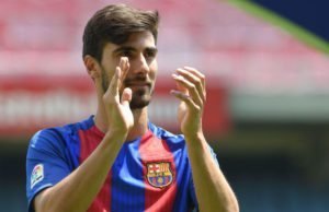 New Barcelona's Portuguesse forward Andre Gomes claps during his official presentation at the Camp Nou stadium in Barcelona on July 27, 2016, after signing his new contract with the Catalan club. / AFP / LLUIS GENE        (Photo credit should read LLUIS GENE/AFP/Getty Images)